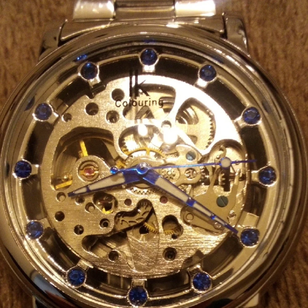 Elegant Silver Watch with Blue Details
